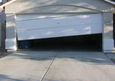 garage door off track repair in in North Hollywood